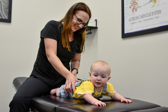Chiropractor Fort Worth TX Randi Lee Adjusting Infant